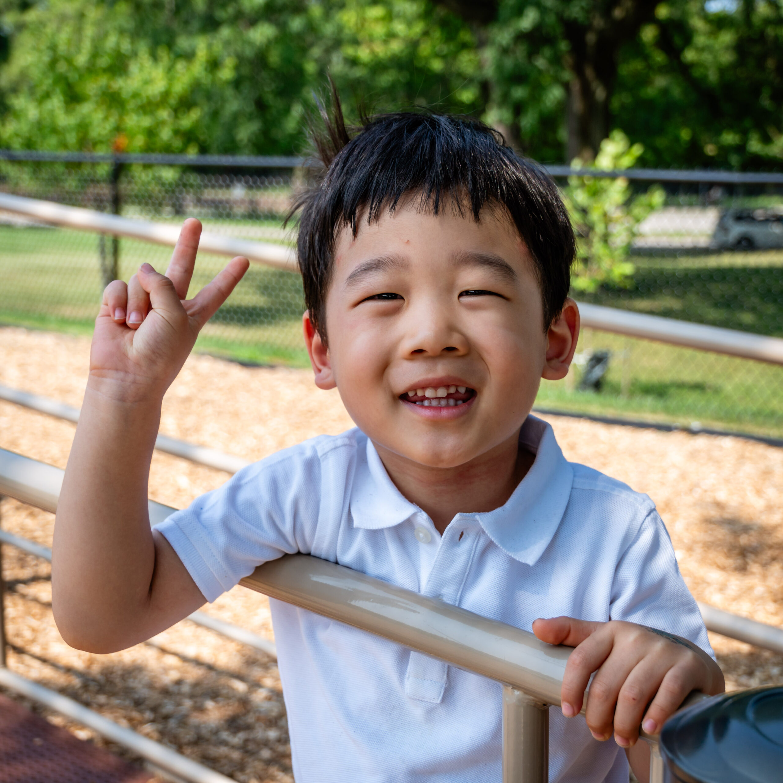 young boy on a slide